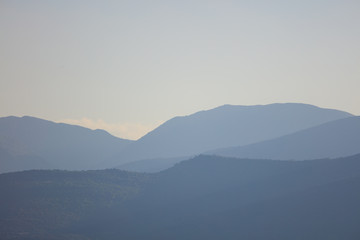Mountain silhouette against of sky