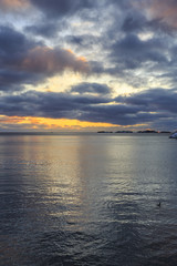 Fototapeta na wymiar Sunset at Henningsvaer shoreline on Lofoten Islands, Austvagoya, Nordland, Norway
