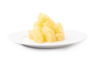 Pile of canned pineapple over isolated white background