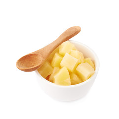 Pile of canned pineapple over isolated white background