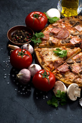 pizza with sausage and cheese and ingredients 