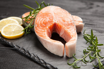 Fresh salmon on old wood