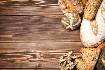Bread assortment on wooden surface