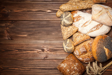 Bread assortment on wooden surface