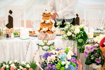 Flowers from guests and traditional wedding bread