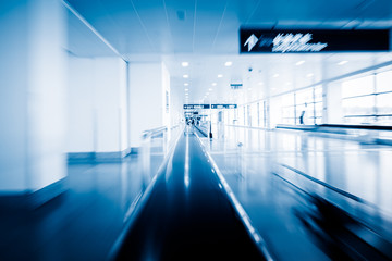 moving walkways at pudong international airport,motion blurred.