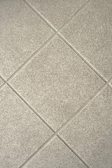 Fototapeta premium Gray tiles, diagonal pattern