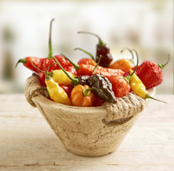 hot pepper mix photographed in a stone basket