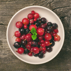 Summer berries in white bowl