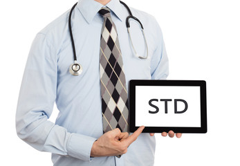 Doctor holding tablet - STD