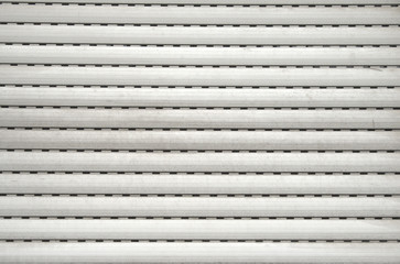 Roller shutter made from plastic on a domestic home, roller blind