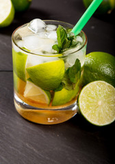 Mojito drink on black stone background