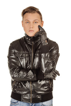 Portrait of a young man in a black jacket looking at camera. Image on a white background.