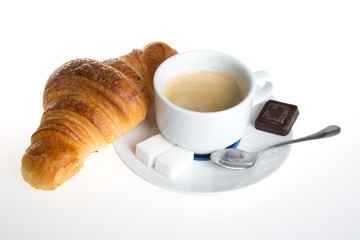 Cup of coffee with french croissant and chocolatine with chocolate