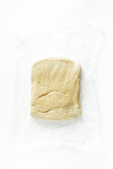 sweet puff dough in plastic wrap