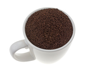 Kona coffee ground beans in a cup