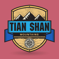 Stamp or vintage emblem with text Tian Shan Mountains