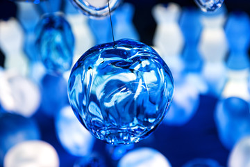 Cool blue glass ball with creases