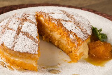 Delicious dessert of naked pumpkin cake on the plate