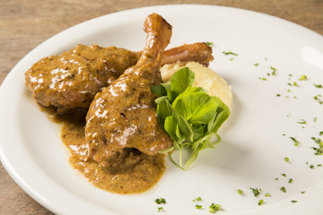 roast duck with mashed potato on the plate