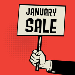 Hand holding poster, business concept with text January Sale