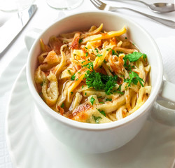 Broth with pancakes and parsley 
