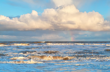 rainbow over stormy North sea