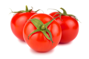 Three ripe red tomatoes