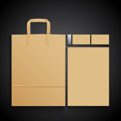 Mockup of branding elements on black background, set