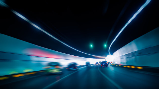 Car Driving Through Tunnel