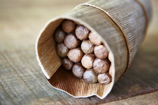 Wrapped package of cuban cigars on table, Cuba