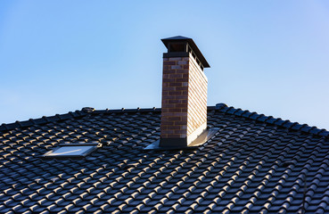 house with a gable roof window