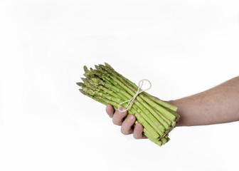 Spargel in der Hand.