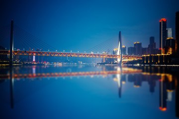 Fototapeta na wymiar Chongqing,China night cityscape at the Jialing River and Qianximen Bridge