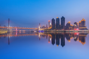 Chongqing,China night cityscape at the Jialing River and Qianximen Bridge