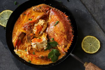 Crab Curry in red coconut curry sauce, overhead view