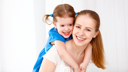 Happy loving family. mother and child laughing and hugging