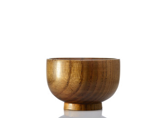 Wooden bowl isolated on white