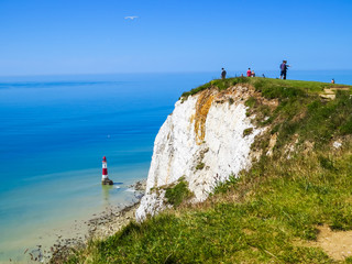 White chalk cliffs and Beachy Head Lighthouse, Eastbourne, East Sussex, England