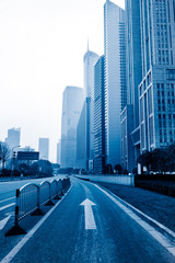 Fototapeta premium city,building,road under blue sky,shanghai china,blue toned image.