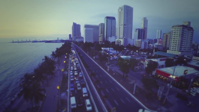  Traffic on Roxas Boulevard in Manila view from above (blue tone)