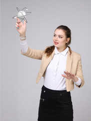 Woman scientist with atom model, research concept