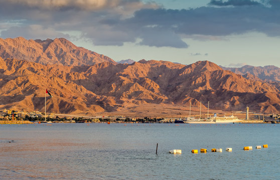 View on the marine port of Aqaba and flag of the Arab Revolt