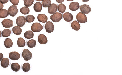 sacha inchi, sacha mani or star inca peanut seed on white background