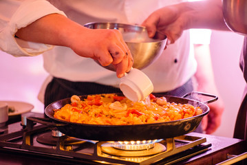 chef making paella
