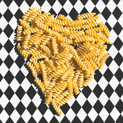 group of fusilli,italian type of pasta, in multicolored background