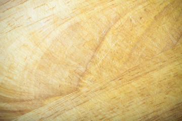 Textured surface of old wooden cutting board. Toned