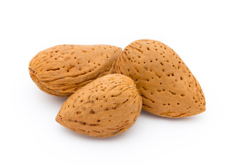 Group of almond nuts. Isolated on a white background.