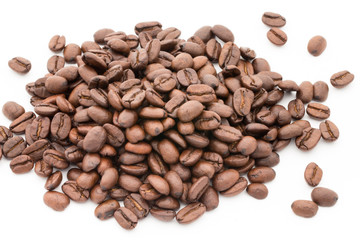 Coffee grains and leaves isolated on the white backgrounds.