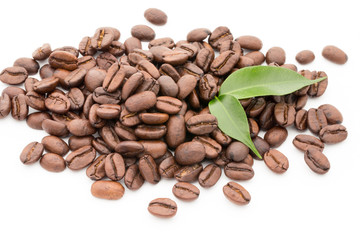 Coffee grains and leaves isolated on the white backgrounds.
